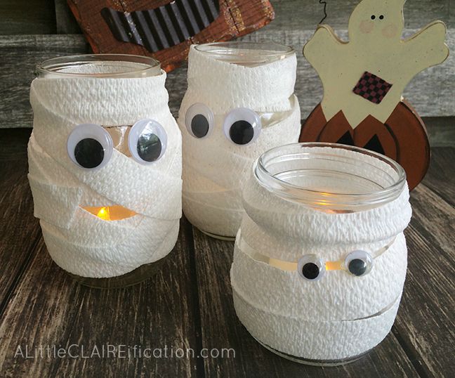 A Little Claireification mummy mason jar luminaries in a jar. Halloween kids craft.
