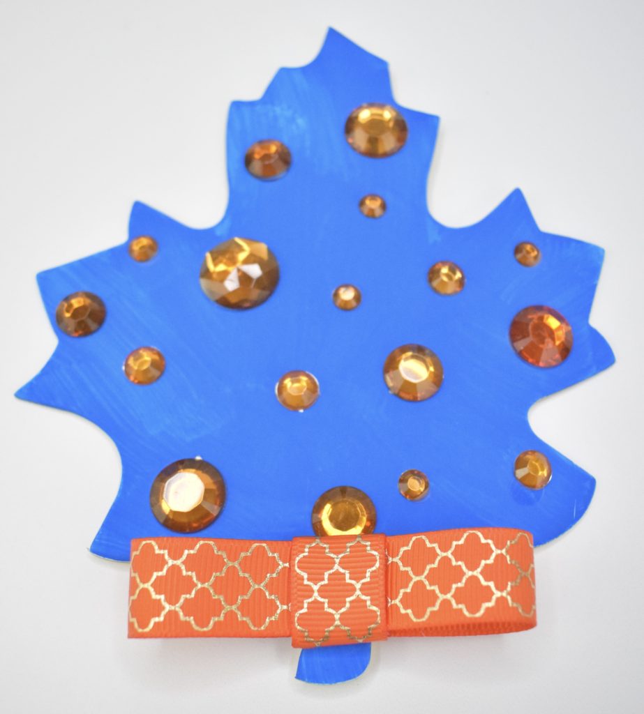 Blue and orange leaf craft with ribbon