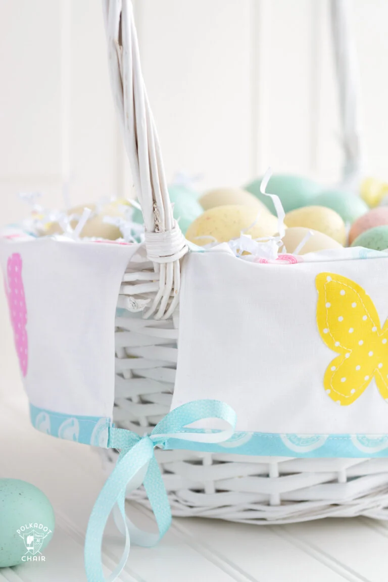 homemade fabric basket liner with blue ribbon